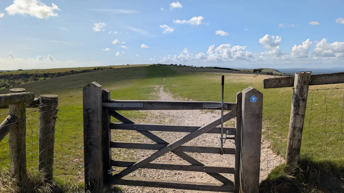A gate on the South Downs Way above the coast